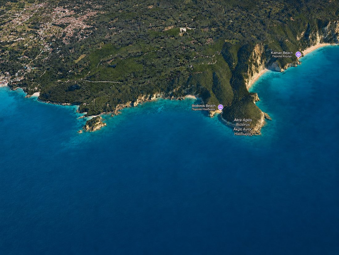 A tilted 3D aerial view of the Liapades coastline in Google Earth, looking east toward Kamari Beach